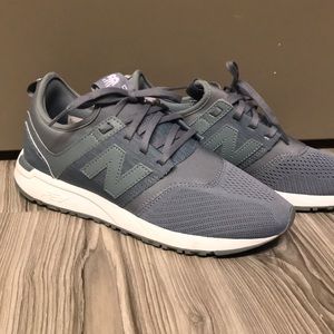 Blue New Balance 247 sneakers